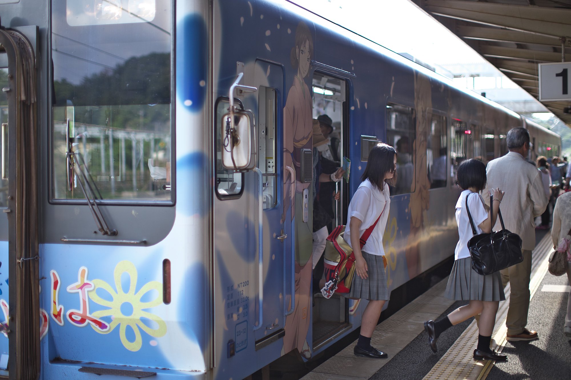 女子高生降車