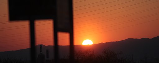春の夕焼け淀河原