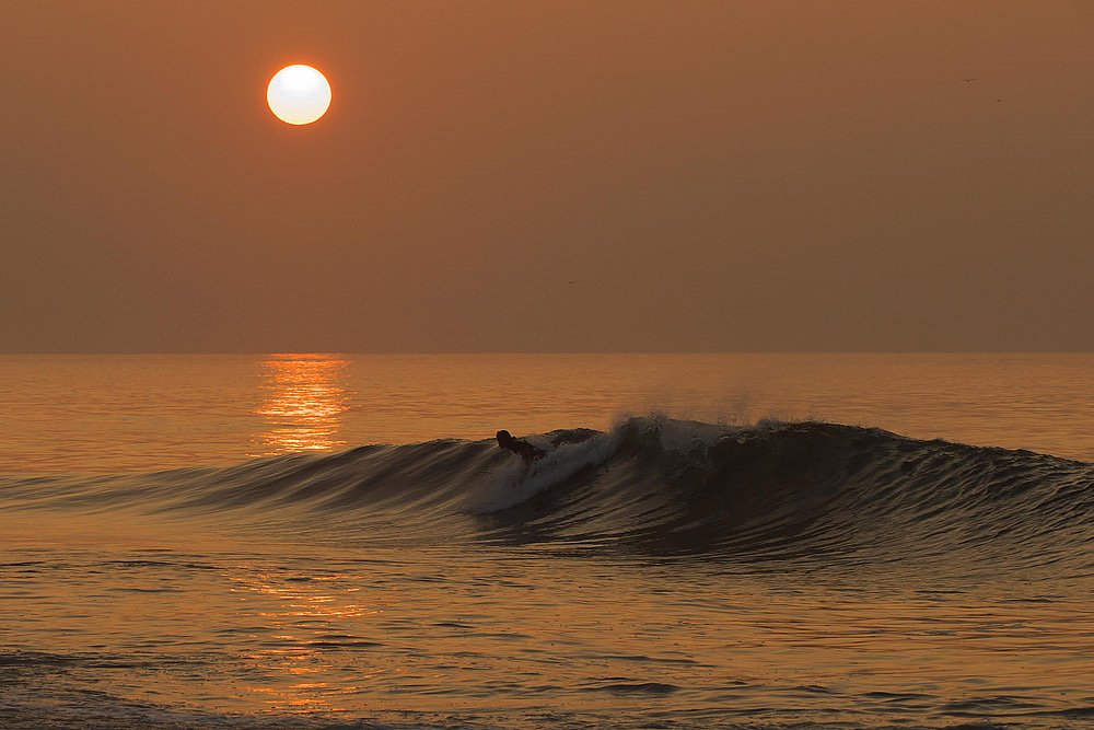Sunrise surfer
