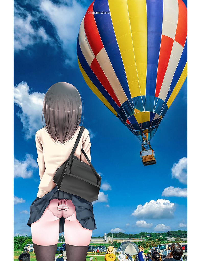 熱気球を見るJK