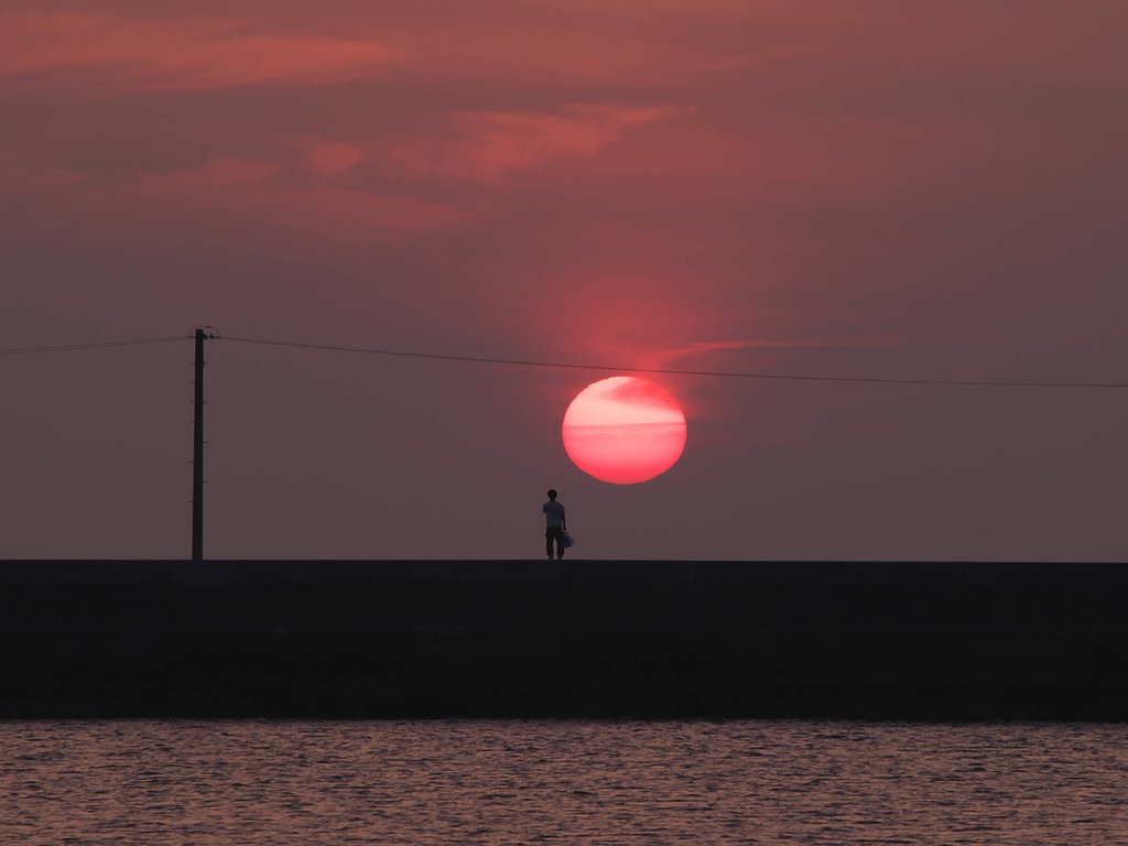 只今夕陽と交信中