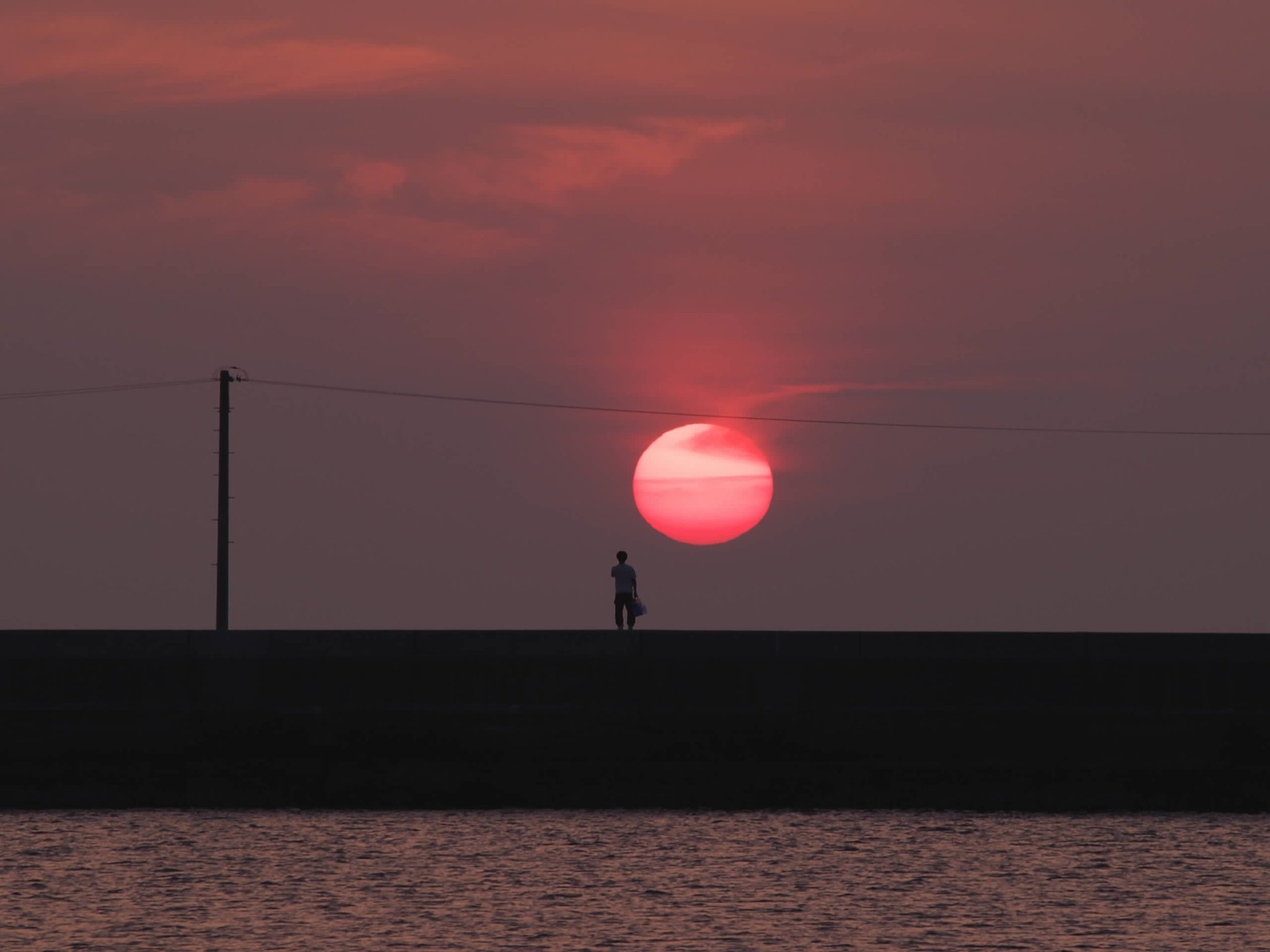 只今夕陽と交信中