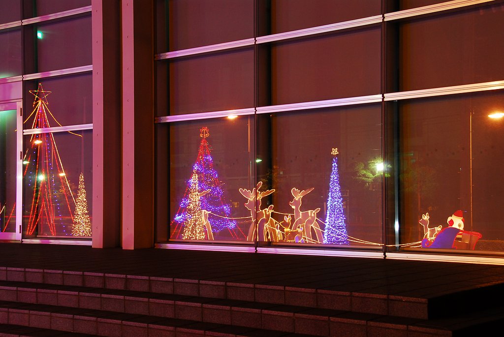 ガラスに映ったサンタさん