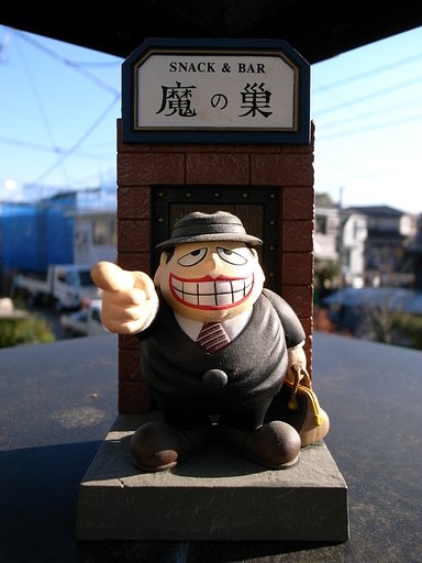 笑うカメラマン